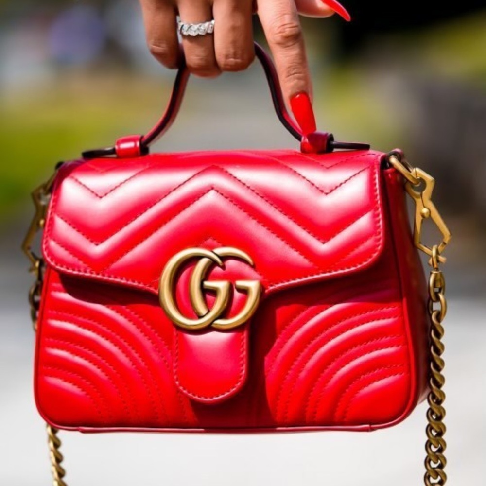 Still available- Gucci GG Marmont mini Top Handle red purse